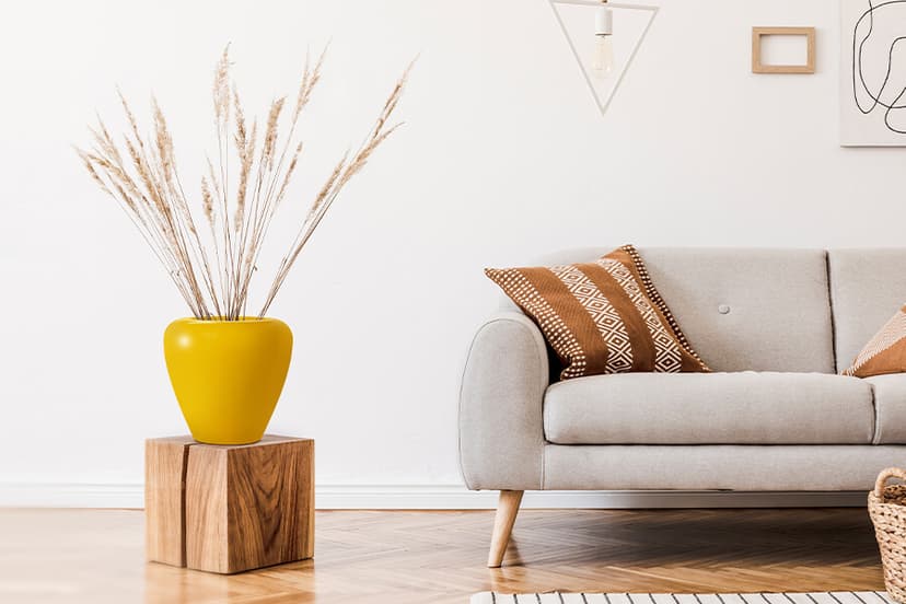 Flower Pot in yellow colour placed in living room