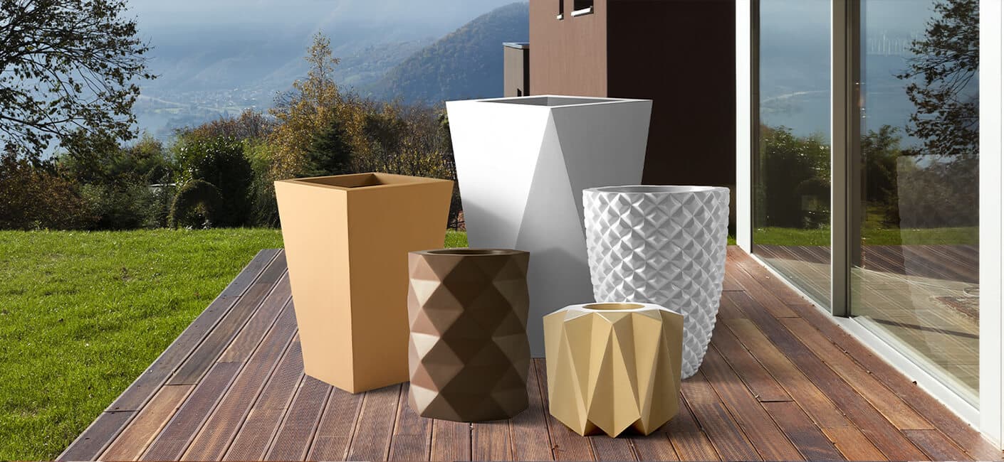 5 designer garden planters  placed besides each other