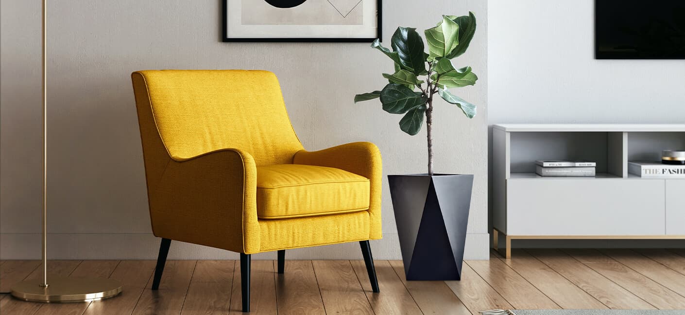 Decorative Planters remino placed besides a yellow sofa 